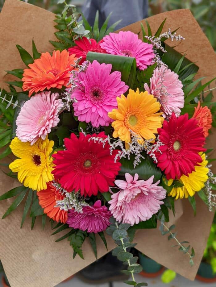 The Watering Can | A bright and colourfuln hand-tied gerbera daisy bouquet.