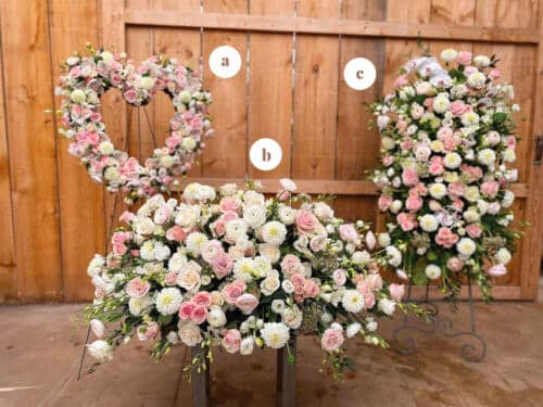 The Watering Can | A matching pink and white heart, an easel spray, a casket spray bereavement design.