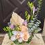 The Watering Can | A pastel coloured European style arrangement with fresh and dried flowers.