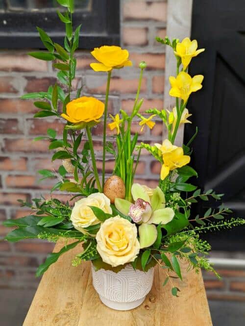 The Watering Can | A bright and tall European arrangements from soft yellow to deep sunny yellow.