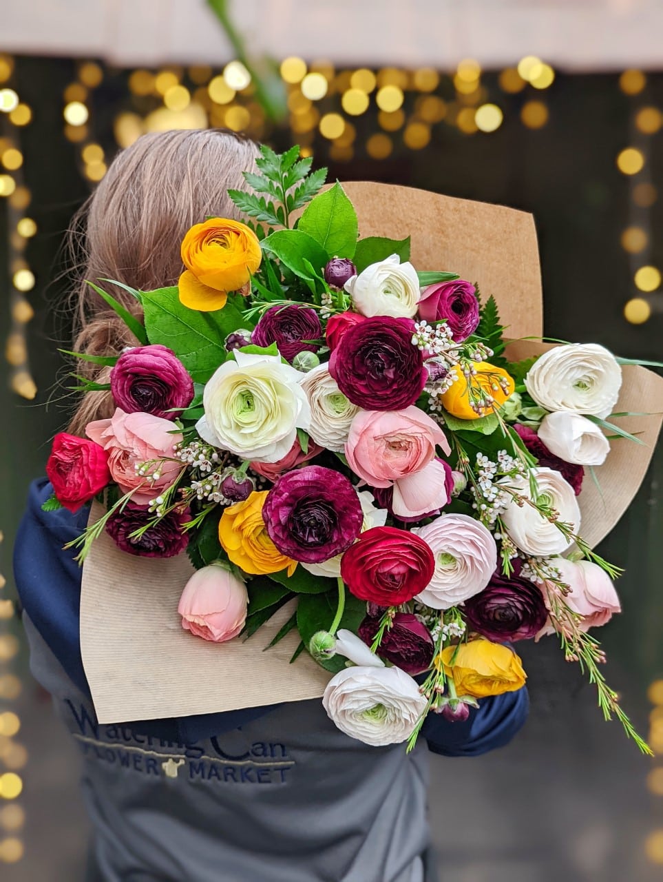 The Watering Can | A bright and colourful all ranunculus bouquet.