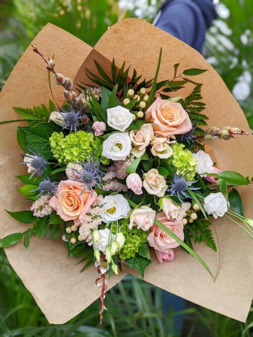 The Watering Can | A springtime bouquet in blush and white tones.