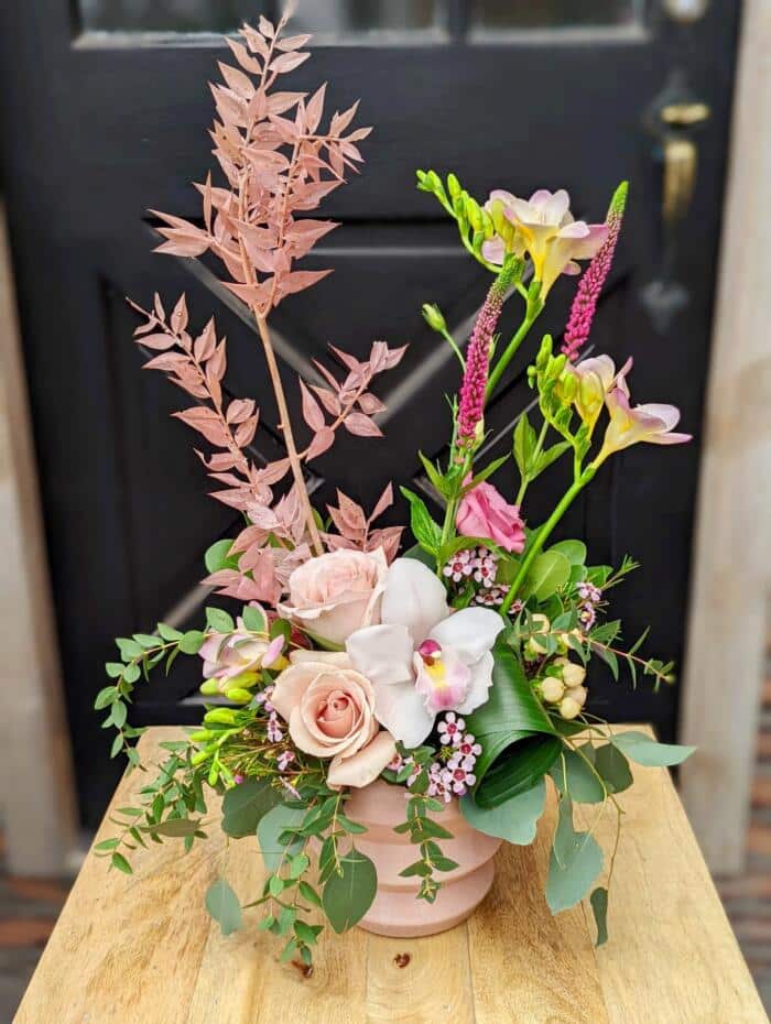 The Watering Can | A tall pink European style arrangement with flair!