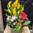 grey round container, yellow calla lily, pink begonia, rosaroma, ivy and orage butterfly